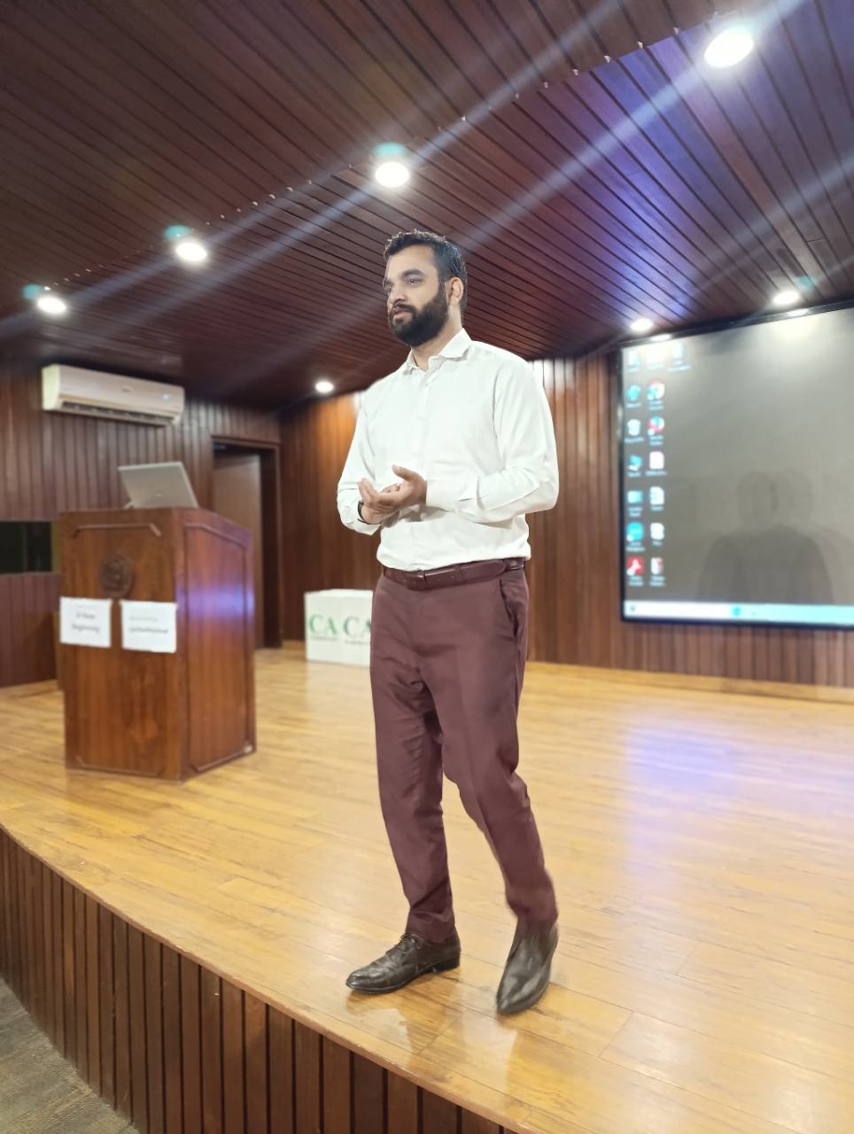 Zeshan Saif speaking at a Toastmasters session